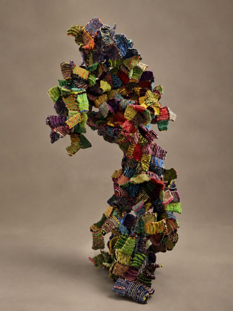 Cascading patchwork form. Pipe cleaner sculpture by Ted Fullwood
