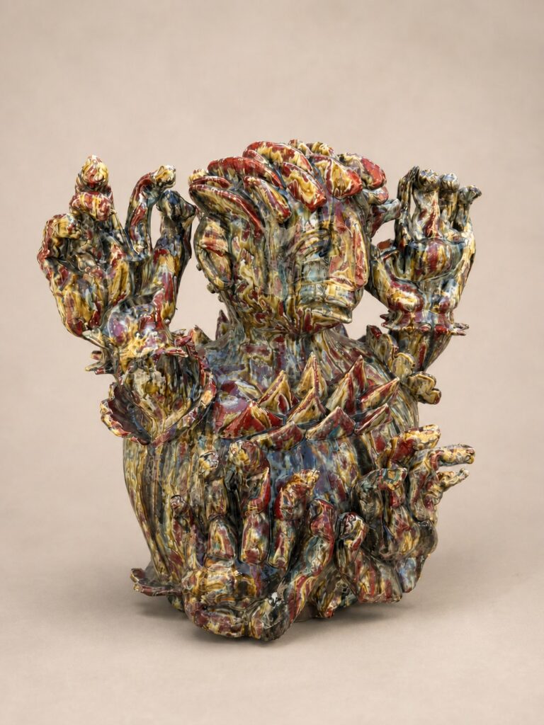 Multicolor flame-like form. Ceramic sculpture by Ted Fullwood